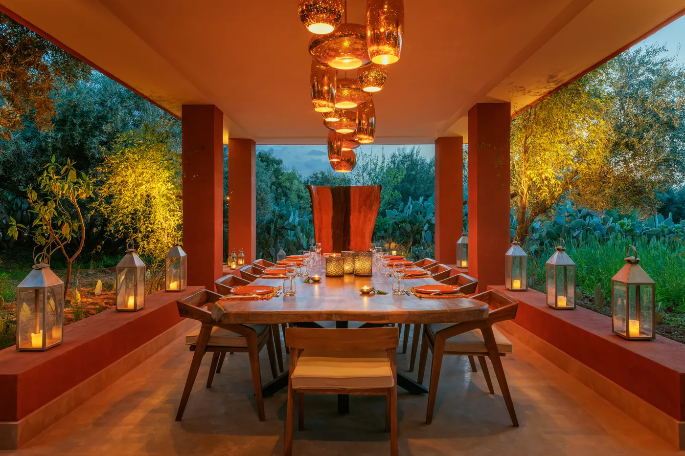 Atmospheric covered dining terrace prepared for dinner