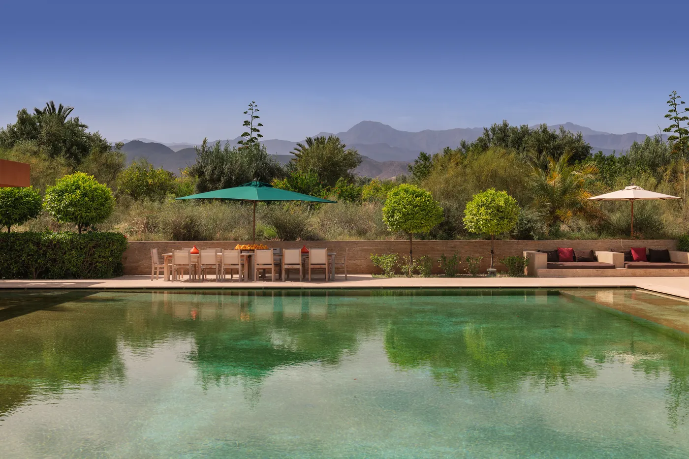 Garden reflection pool with the Atlas Mountains beyond