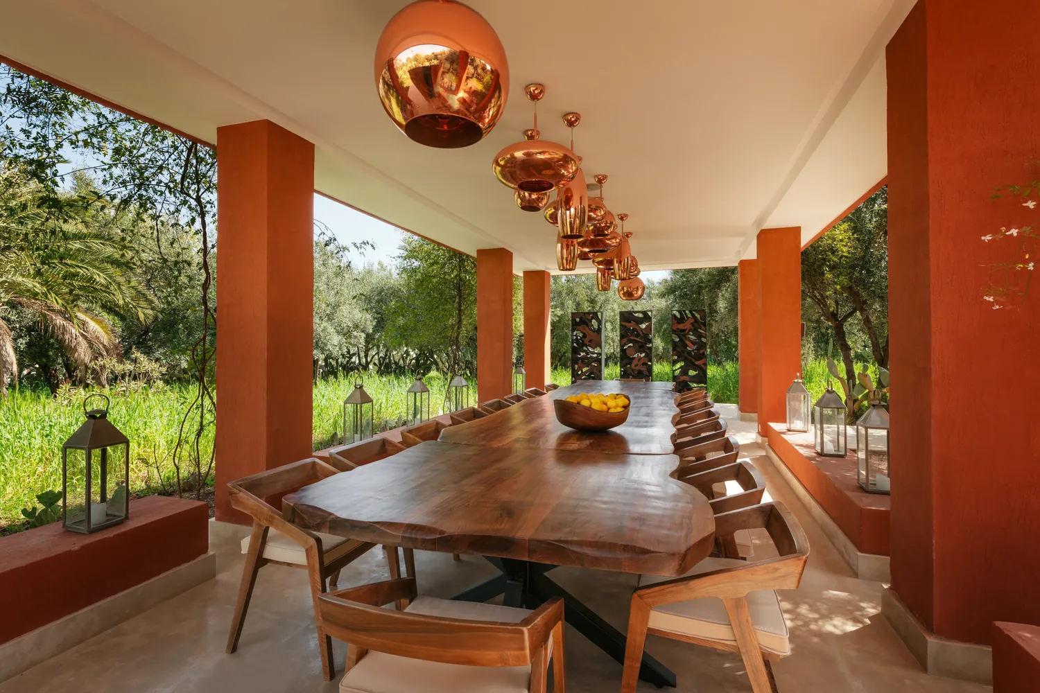 Covered outdoor dining area overlooking the gardens