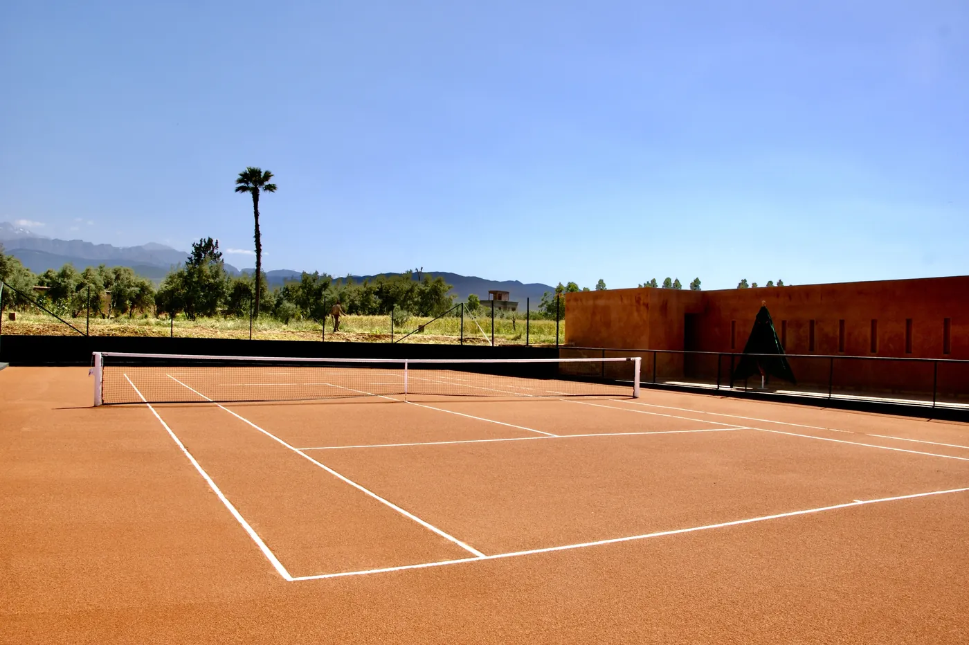 Private tennis court with mountain views